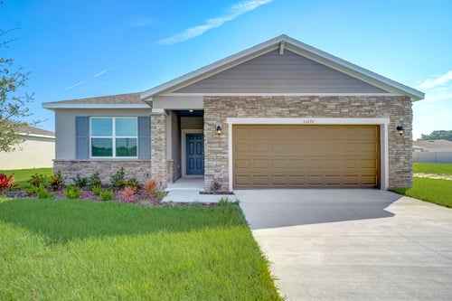 Beautiful new single-family home with stone exterior.