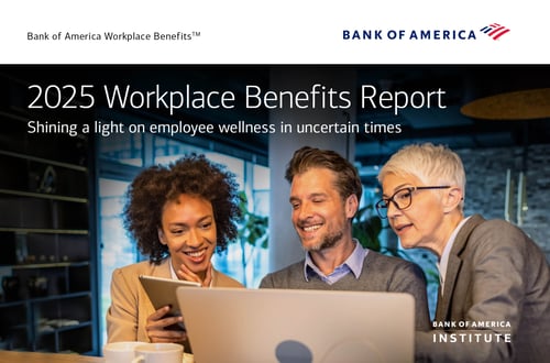 3 individuals converse while looking at a report together