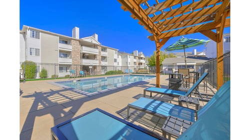 Apartment complex with pool at Ascent Apartments, Denver, CO