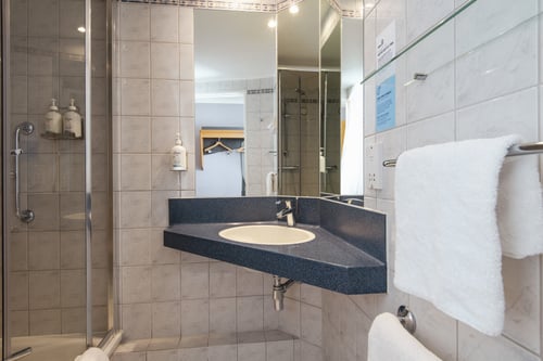 The en suites feature a power shower and Dove toiletries.