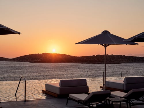 Sunbeds by the Infinity Pool with Sea View