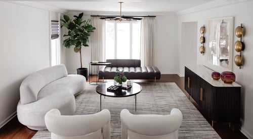 Designed living room with a white couch