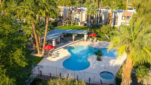 Apartment complex with pool at Monaco at McCormick Ranch, Scottsdale, AZ