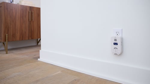A Carbon Monoxide Detector is plugged into the wall.