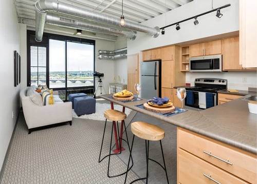 Open kitchen with living room, Eagle View Lofts, Des Moines, Iowa, 50309