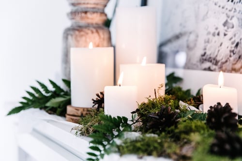 Candles on a fireplace mantle