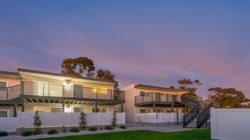 a view of the back of the house at sunset at Seaview Terrace Apartment Homes, California