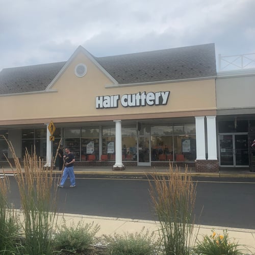 The front entrance of Hair Cuttery at Oxford Oaks Shopping Center.
