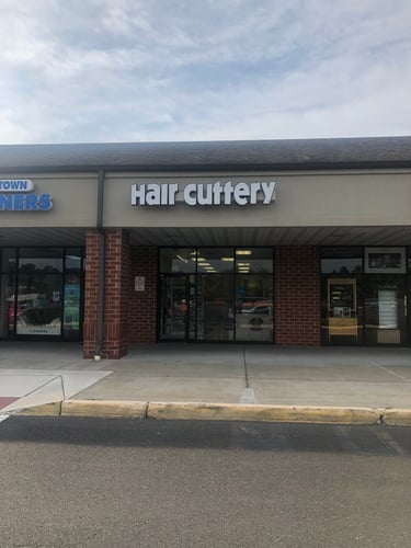 The front entrance of Hair Cuttery at Newtown Shopping Center.