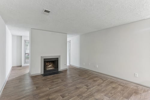 Living area with fireplace at Brighton Way, Smyrna, GA.