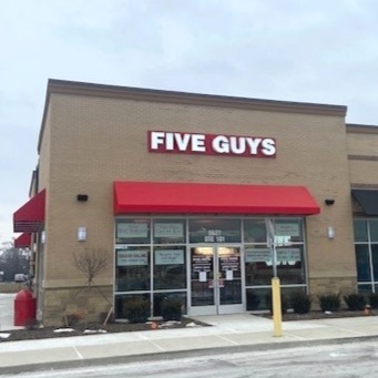 Exterior photograph of the Five Guys restaurant at 5627 Jackson Road in Scio Michigan.