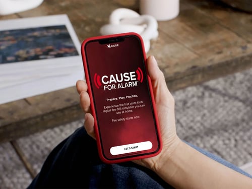 Hand holding phone with AR tool app screen