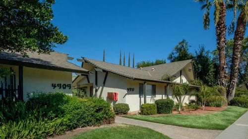 lush grass and exterior landscaping at the Reef apartments in Fresno, CA