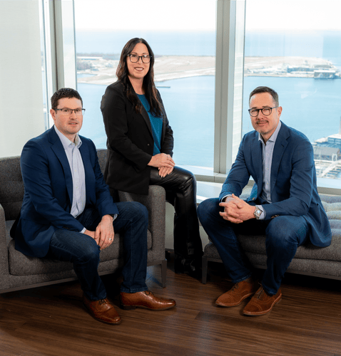 A photo of Graham Hill, Tara Medeiros, and Jeffrey K. Jones.