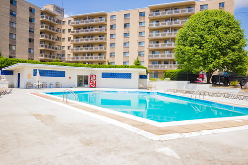 Outdoor pool with lounge chairs