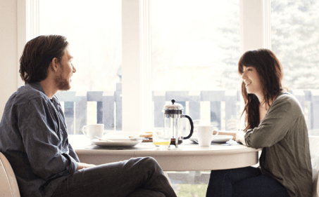 financial advisor sitting at table with client
