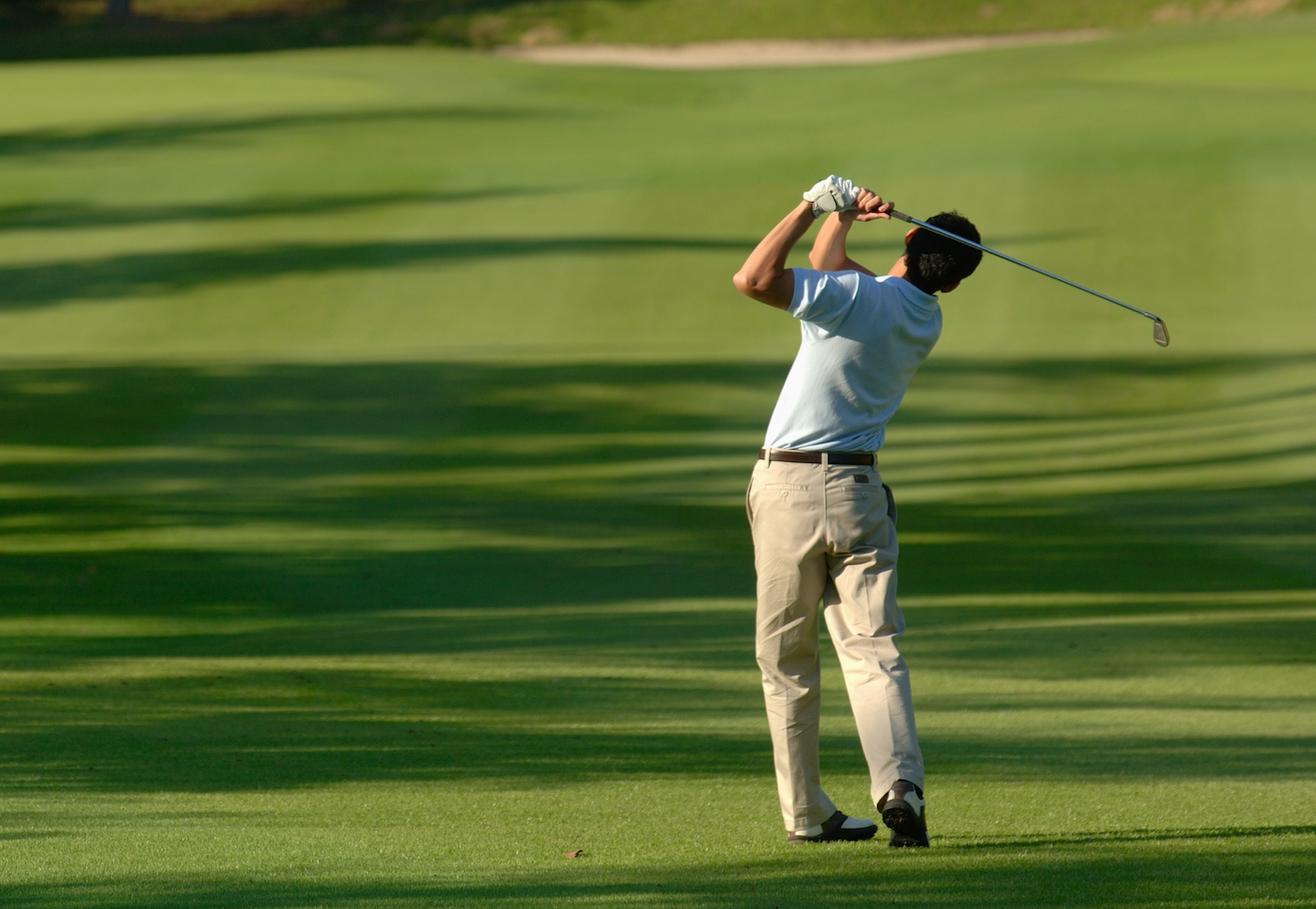 golfer mid-swing