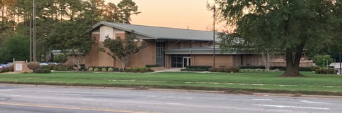 christian church building and parking lot