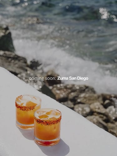 Two signature cocktails by the ocean