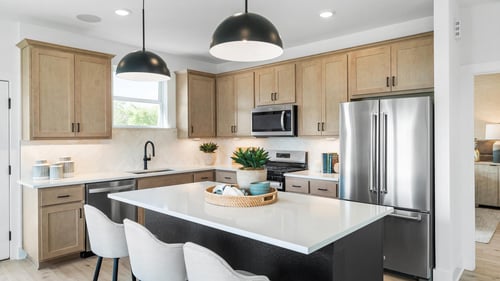 Designer appointed gourmet kitchens with a sizable island