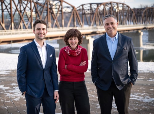 Photo of the team in front of the Traffic Bridge.