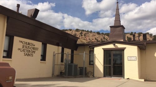 Light tan building with brown roof
