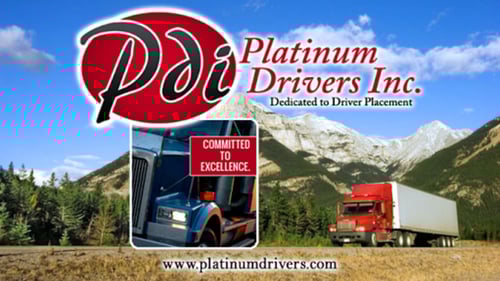 semi truck driving down the road with company logo