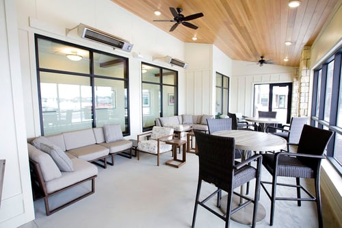 Off the main entrance of the Gathering Place, a three-season screened-in patio offers radiant heat from the ceiling to make it a pleasant place to relax even on cold days.