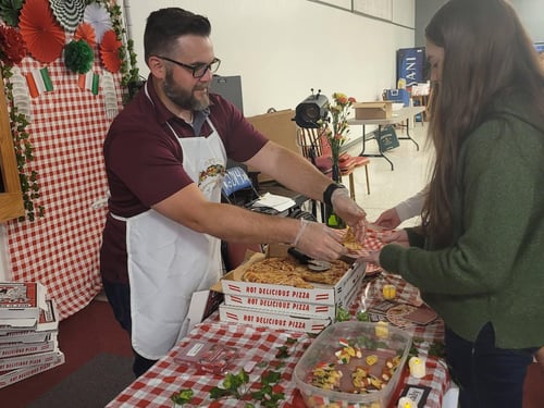 Serving pizza to Donoho Students