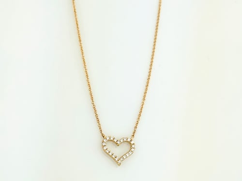 Collier coeur en or jaune et diamants