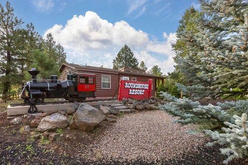 A train and railroad are incorporated into signage at PVC at the Roundhouse Resort.