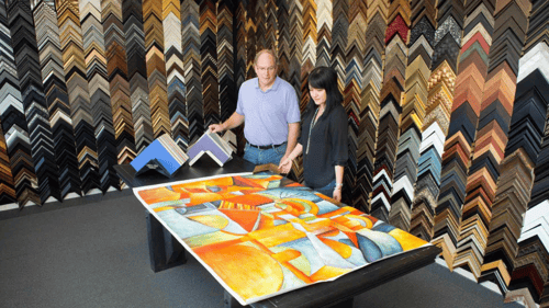 large piece of art being framed