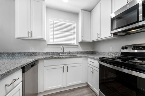 Brand New Kitchen with Modern, Stainless Steel Appliances