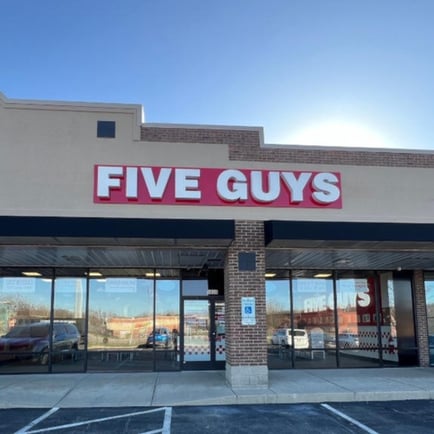 Exterior photograph of the Five Guys restaurant at 5808 Wilmington Pike in Centerville Ohio.