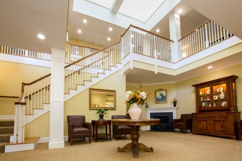 Senior facility reception lobby and grand staircase
