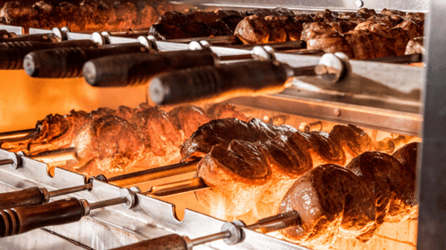 All of our meats are cooked the gaucho way - over an open flame with natural wood charcoal.