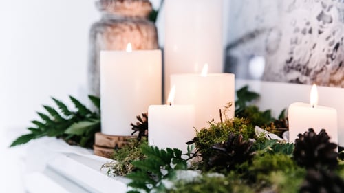 Candles on a fireplace mantle