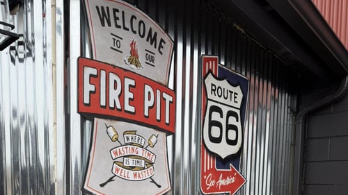 Two signs on the outisde of Scooters BBQ