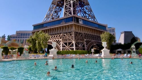 Pool á París main pool view. You won’t get a view like this at any other Las Vegas pool. Pool á París is located right underneath the hotel’s Eiffel Tower replica at Paris Las Vegas, positioned in the heart of the Las Vegas Strip. Take rest and relaxation to the next level with a lounge chair, daybed or cabana rental at Pool á París. The romantic atmosphere paired with various amenities will leave you rejuvenated and ready for the evening on the famed Las Vegas Strip.