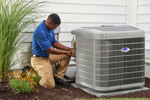 A Carrier dealer performs an AC installation