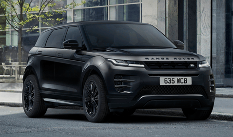 Front view of a black Range Rover Evoque parked on a city street.