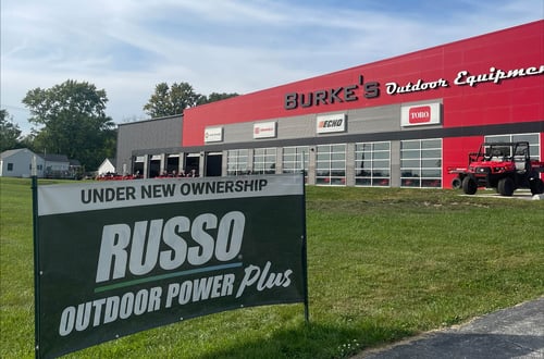 Under new ownership Russo banner in front of Burke's Outdoor Equipment building