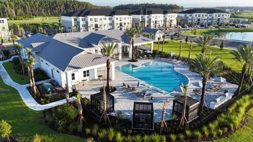 overhead view of the clubhouse and swimming pool at sentosa epperson apartment complex