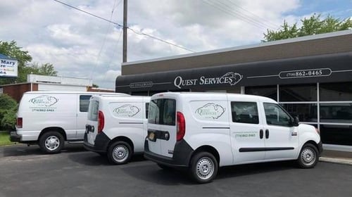 three white service vans