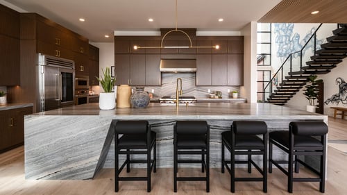 Expansive gourmet kitchens with large islands and stainless appliances