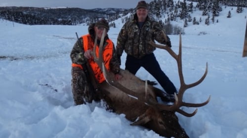 two hunters with catch