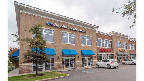 External view of local credit union and adjoining stores in Virginia Beach, VA