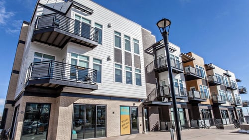 A building with balconies and a street light in front of it at Delo Apartments, Louisville, CO 80027