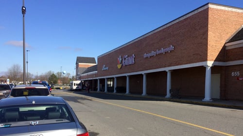 Silver car in front of Shop Rite