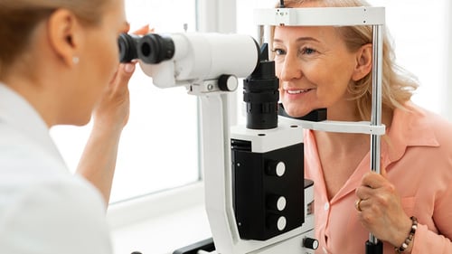woman getting eye exam